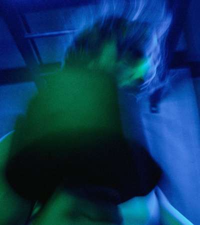 sportclub het eiland photography by daniil lavrovski and twice shy featuring a man boxing, with a blue filter placed on top